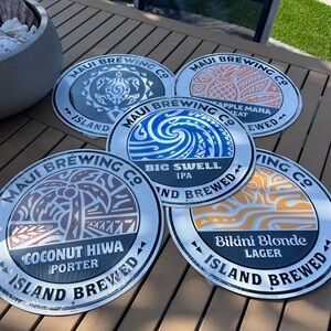Maui Brewing tin tacker signs.